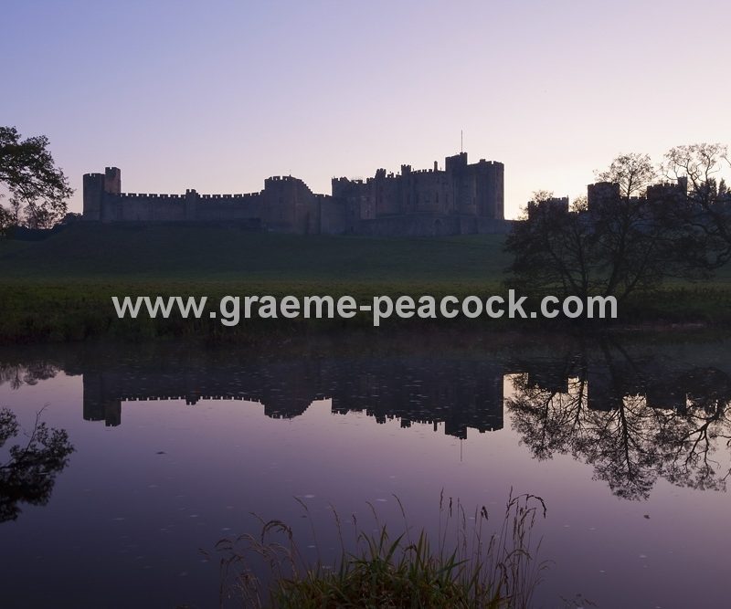 Alnwick Castle at dusk, Alnwick, Northumberland