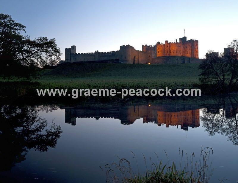 Alnwick Castle at dusk, Alnwick, Northumberland