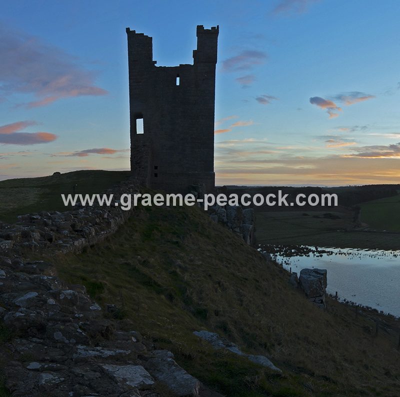 Sunset over Dunstanburgh Castle near Embleton, Northumberland