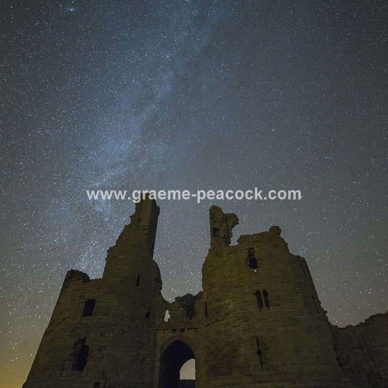 Star gazing under 'Dark Skies' at Dunstanburgh Castle near Craster, Northumberland