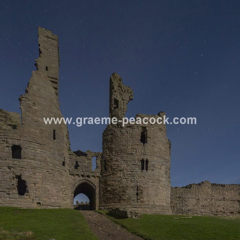 Star gazing under 'Dark Skies' at Dunstanburgh Castle near Craster, Northumberland