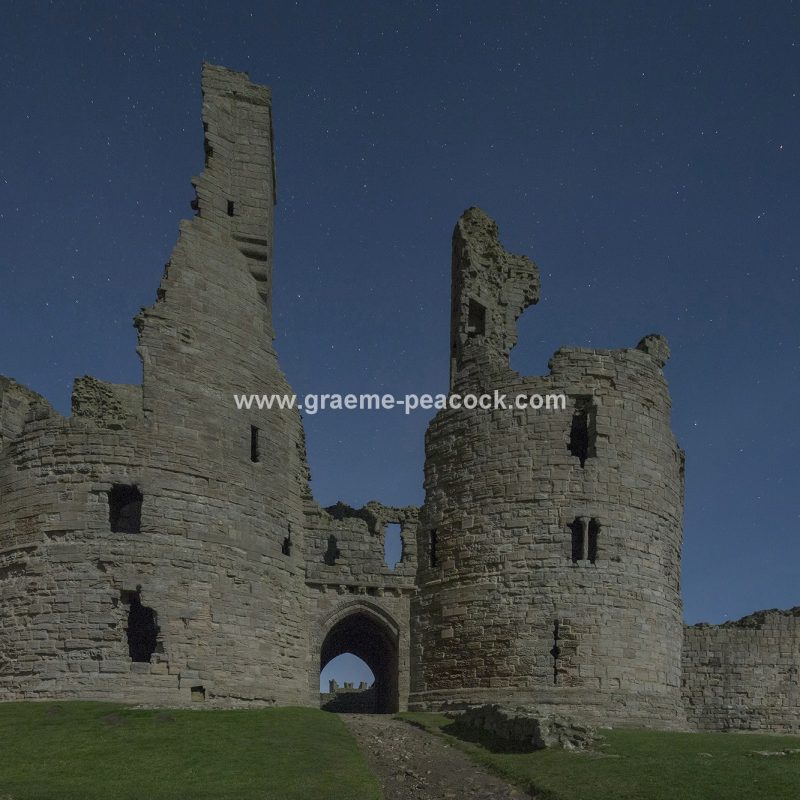 Star gazing under 'Dark Skies' at Dunstanburgh Castle near Craster, Northumberland