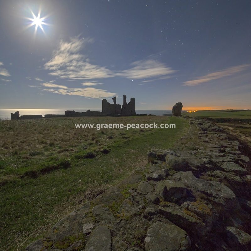 Star gazing under 'Dark Skies' at Dunstanburgh Castle near Craster, Northumberland