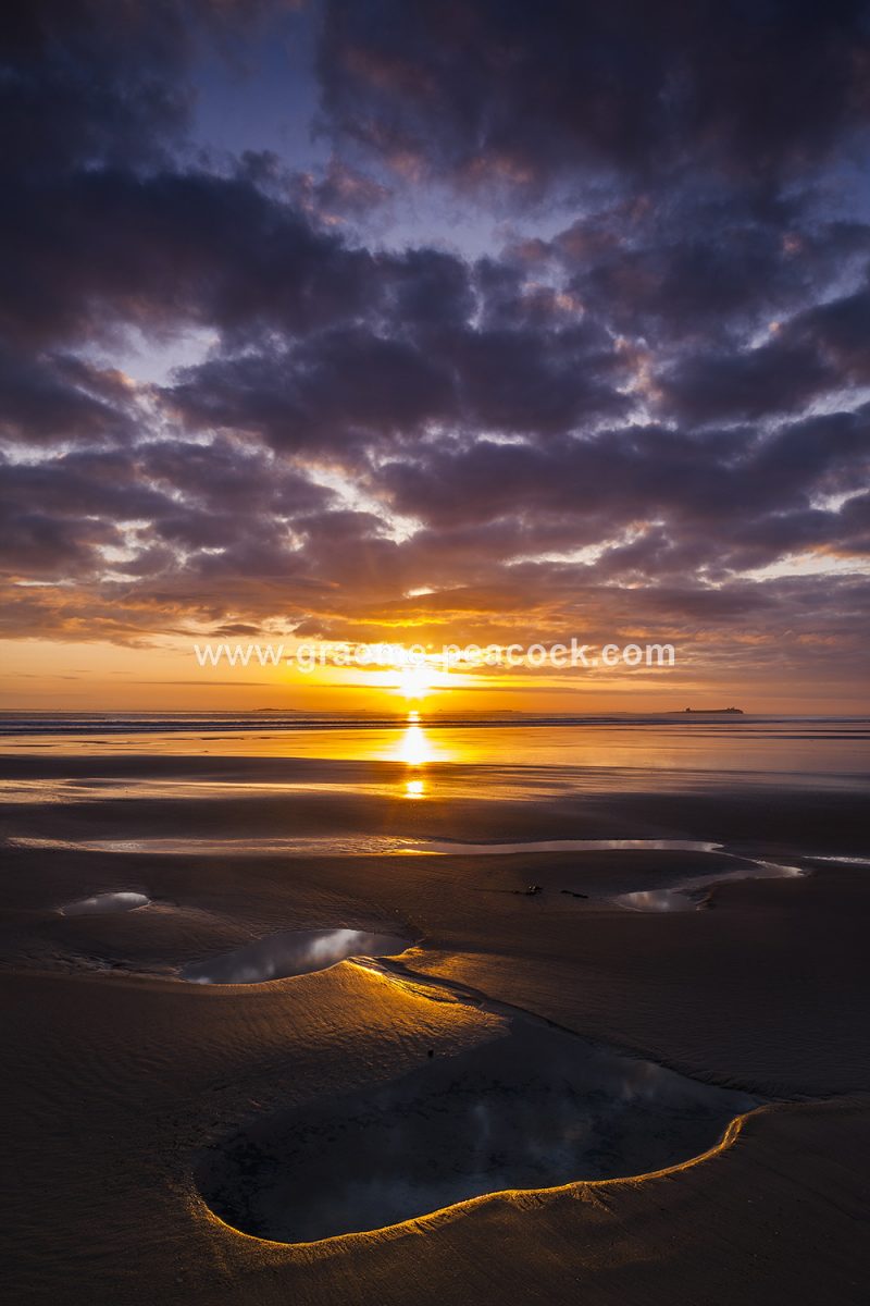 Sunrise over the Farne Islands near Bamburgh, Northumberland
