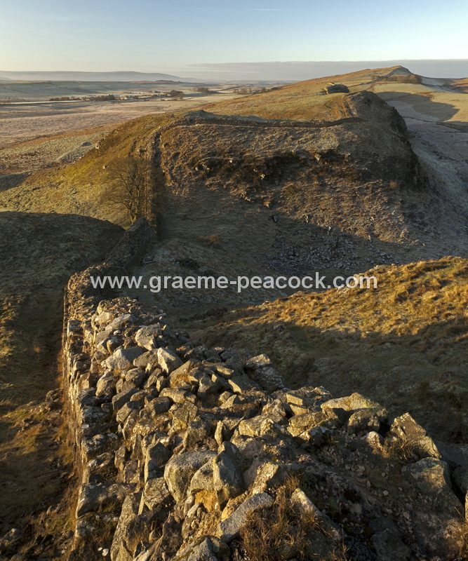 View West over Sycamore Gap and Steel Rigg on Hadrian's Wall near Bardon Mill, Northumberland