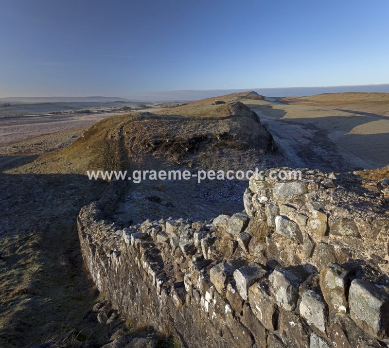 View West over Sycamore Gap and Steel Rigg on Hadrian's Wall near Bardon Mill, Northumberland