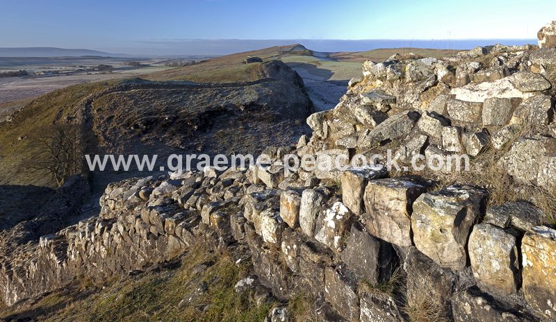 View West over Sycamore Gap and Steel Rigg on Hadrian's Wall near Bardon Mill, Northumberland