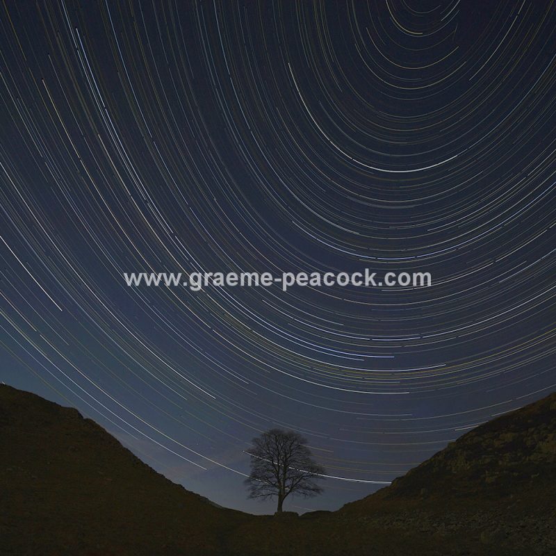 Star trails over Sycamore Gap on Hadrian's Wall near Haltwhistle, Northumberland