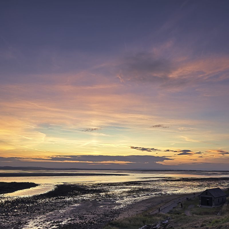 Sunset over St Cuthbert's Island, Lindisfarne, Northumberland, England, United Kingdom