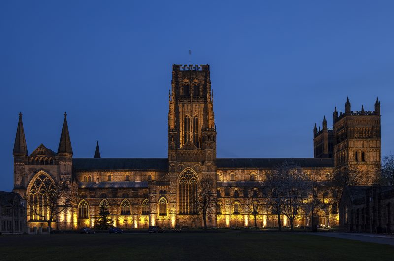 Durham Cathedral floodlit at dusk, Durham City, County Durham, England, UK