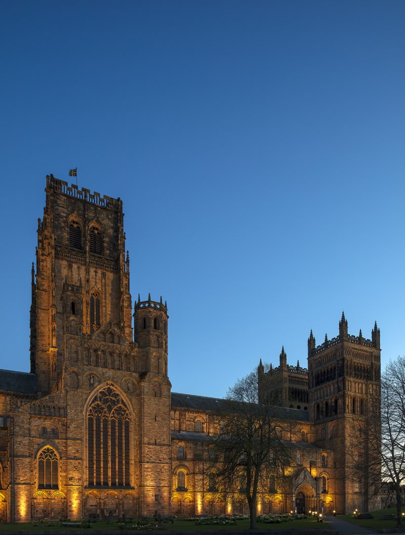 Durham Cathedral floodlit at dusk, Durham City, County Durham, England, UK
